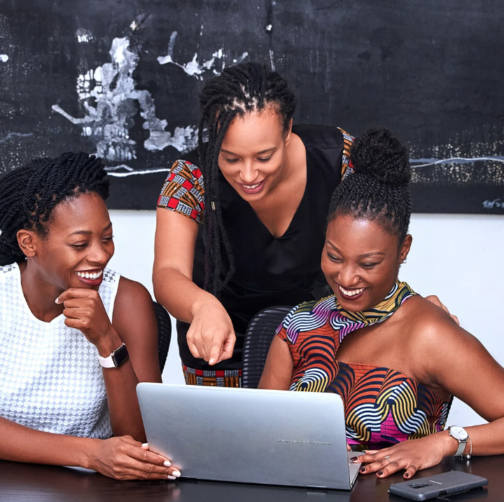 women looking at laptop for online course